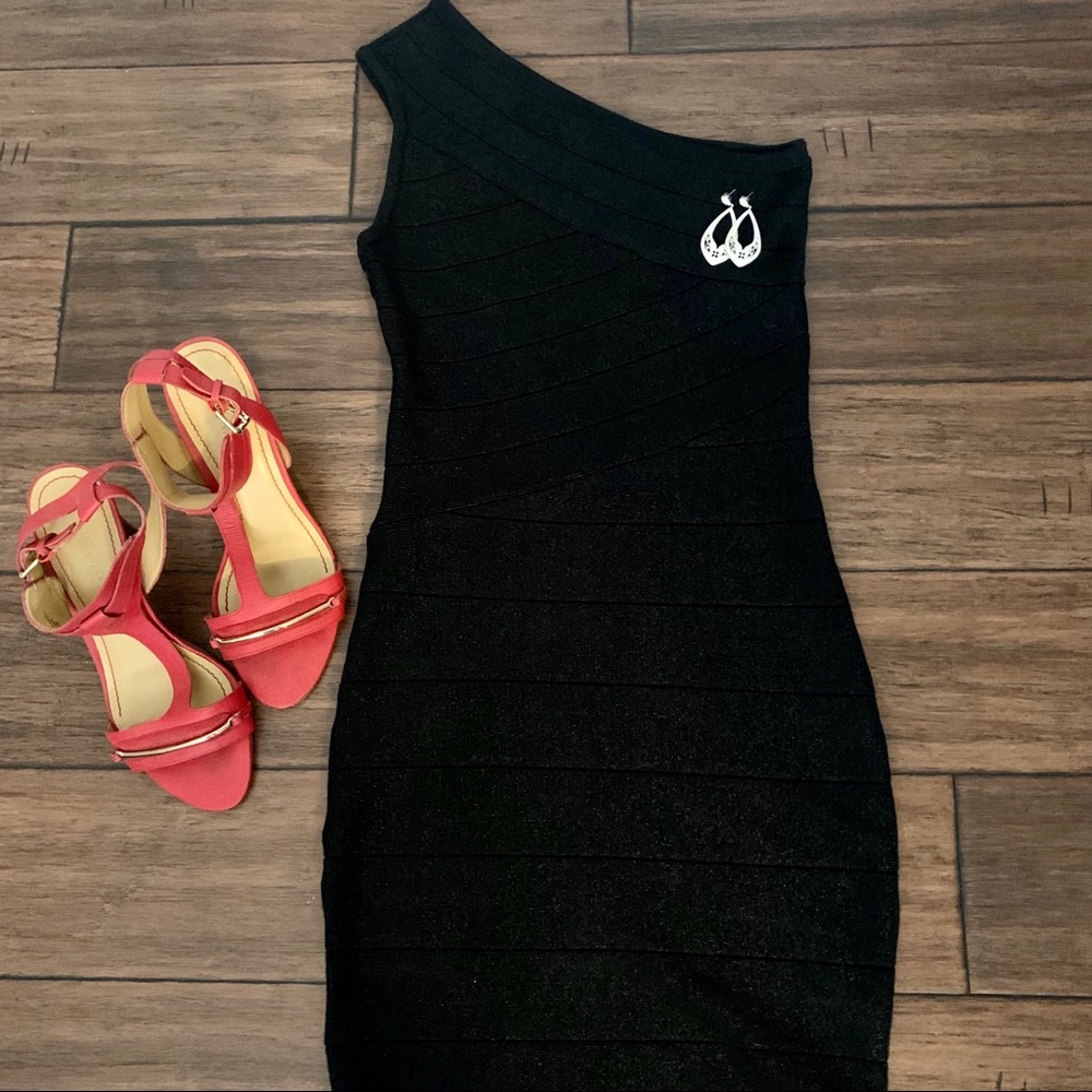 Black sparkly bodycon dress.